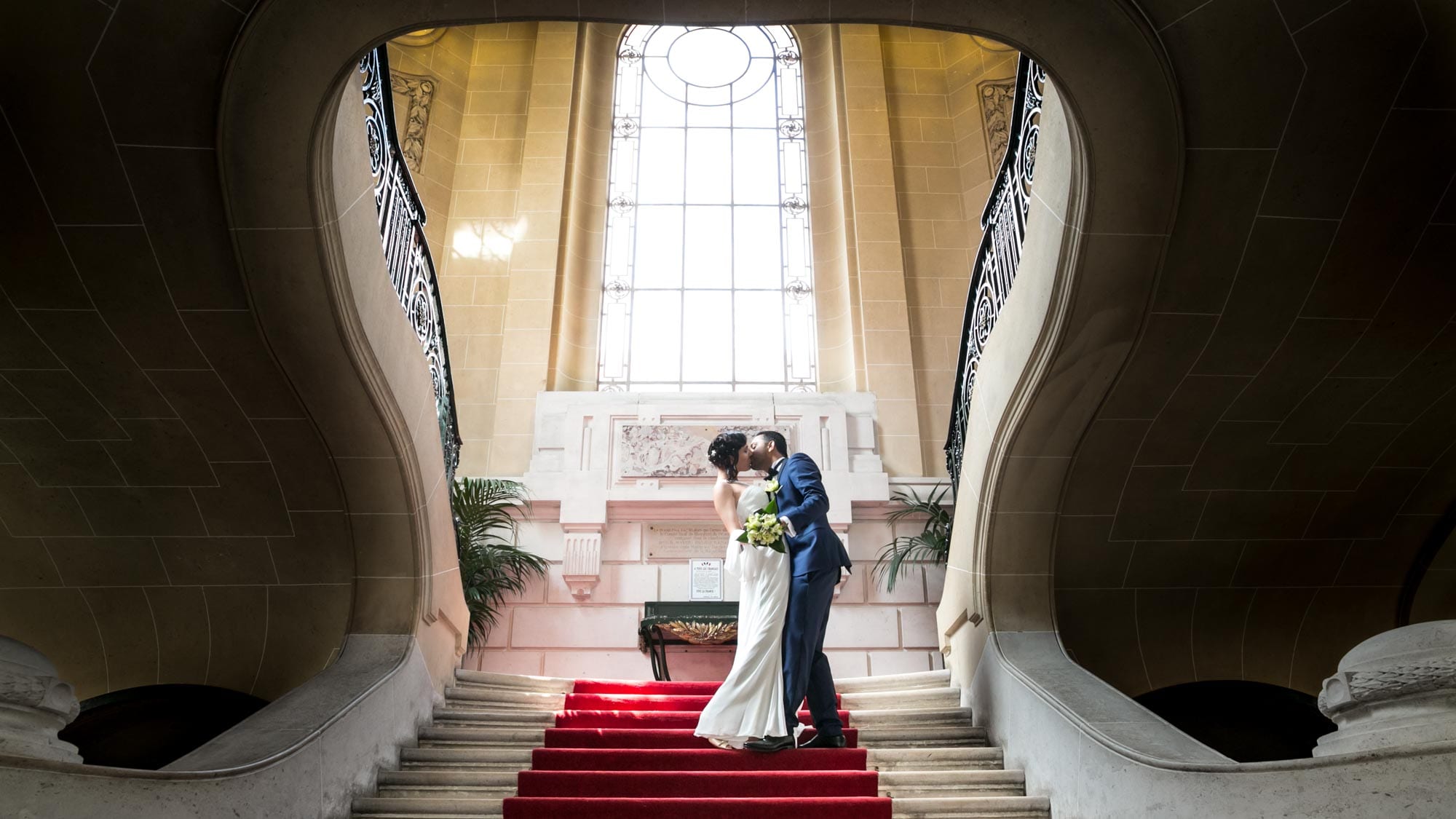 Couple kissing on the stairs