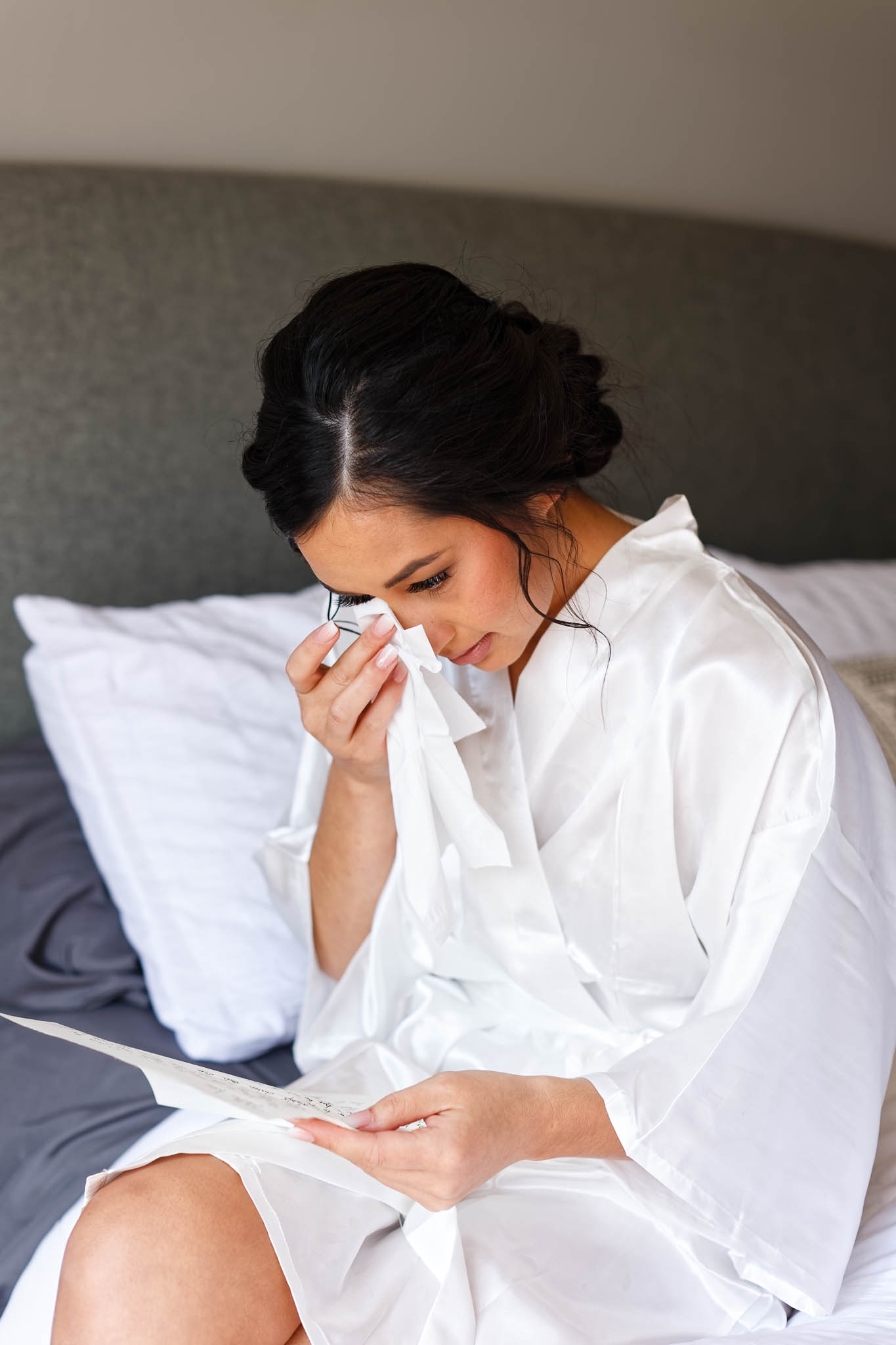 bride crying while ready vows