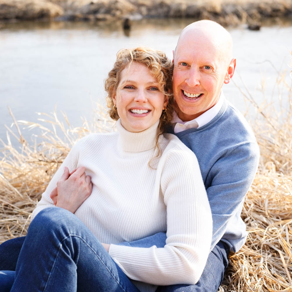 Couple dressed in camaieu of blue and neutral colors