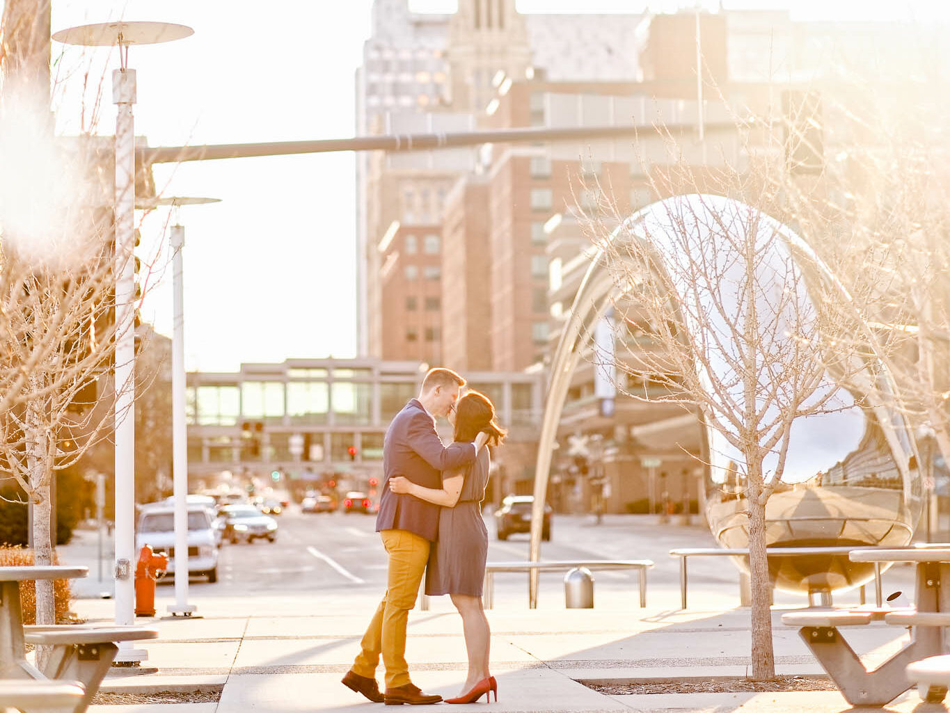 engagement photos with the The Tapered Arch-Shaped Sculpture Rochester and view on 2bd street