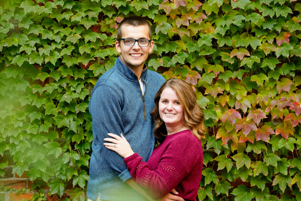 Engagement session in Rochester downtown wall brick Cover with wine