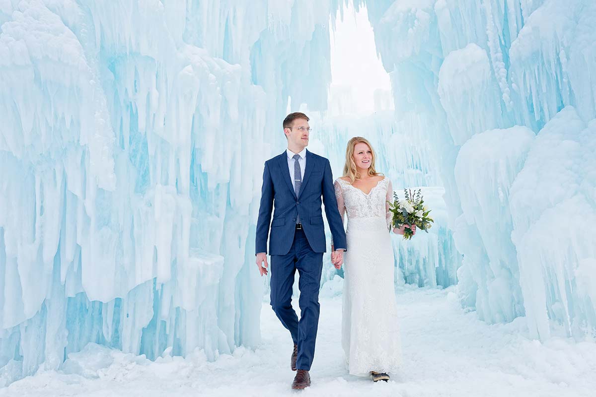 couple-walking-out-of-ice-castle-