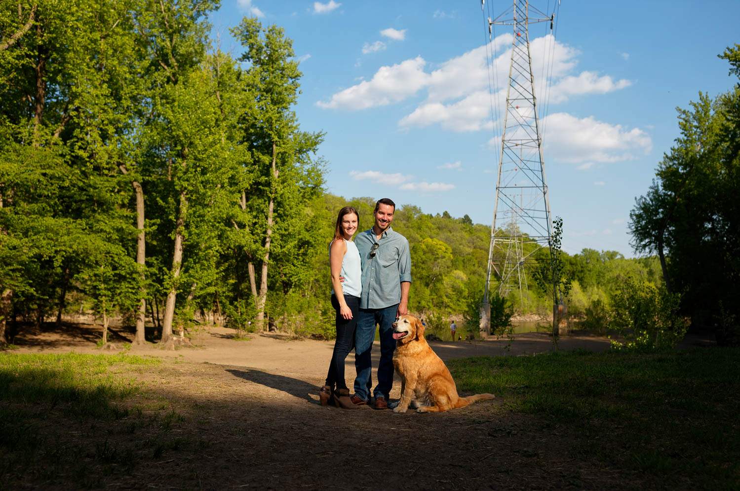 03 couple on trail with their dog at regional park minnehaha