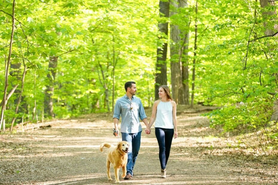 minnehaha dog park couple with their pet walking on greenway