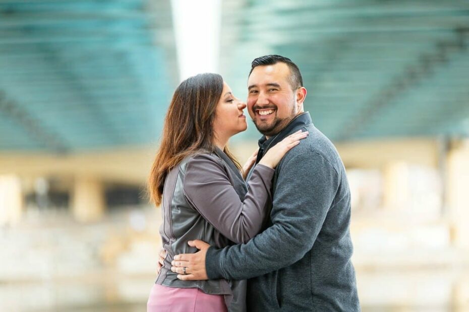 Engagement photo under the Hennepin Avenue bridge in Minneapolis