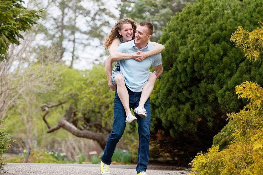 — couple do piggyback at minnesota landscape arboretum —