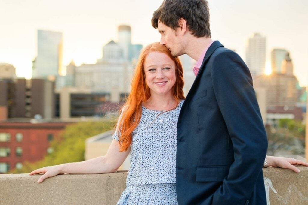 red hair girl with fiancé rooftop minneapolis