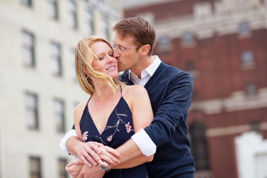 kissing on rooftop cloudy day