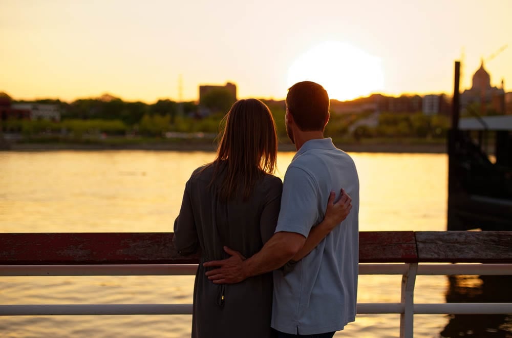 partners looking the sunset with mississippi