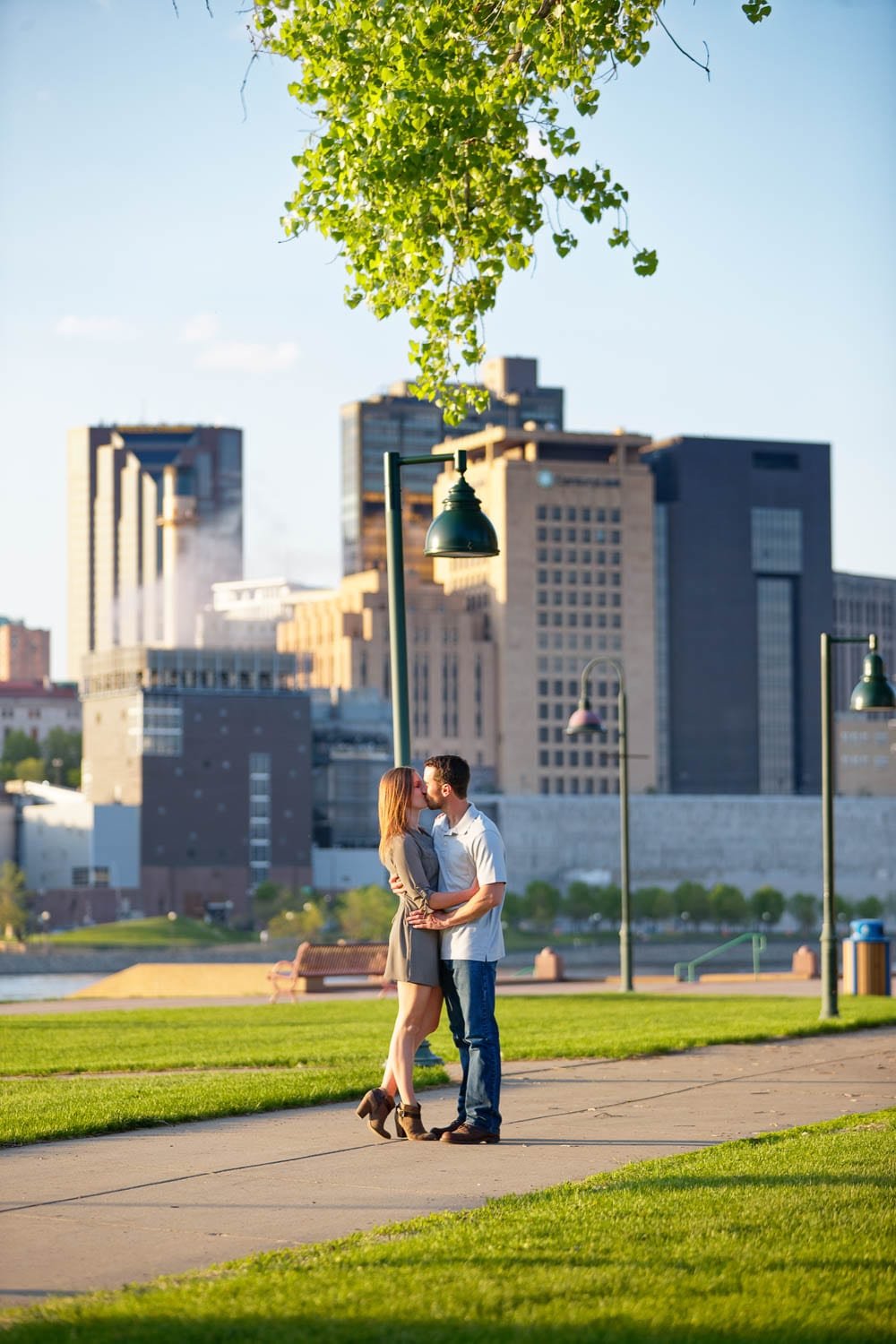 harriet island engagement photos passionate kiss with a modern background