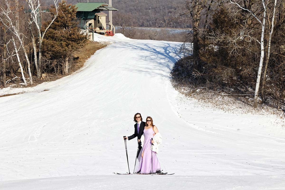 couple-on-ski-and-landscape-with-tracks-and-trees