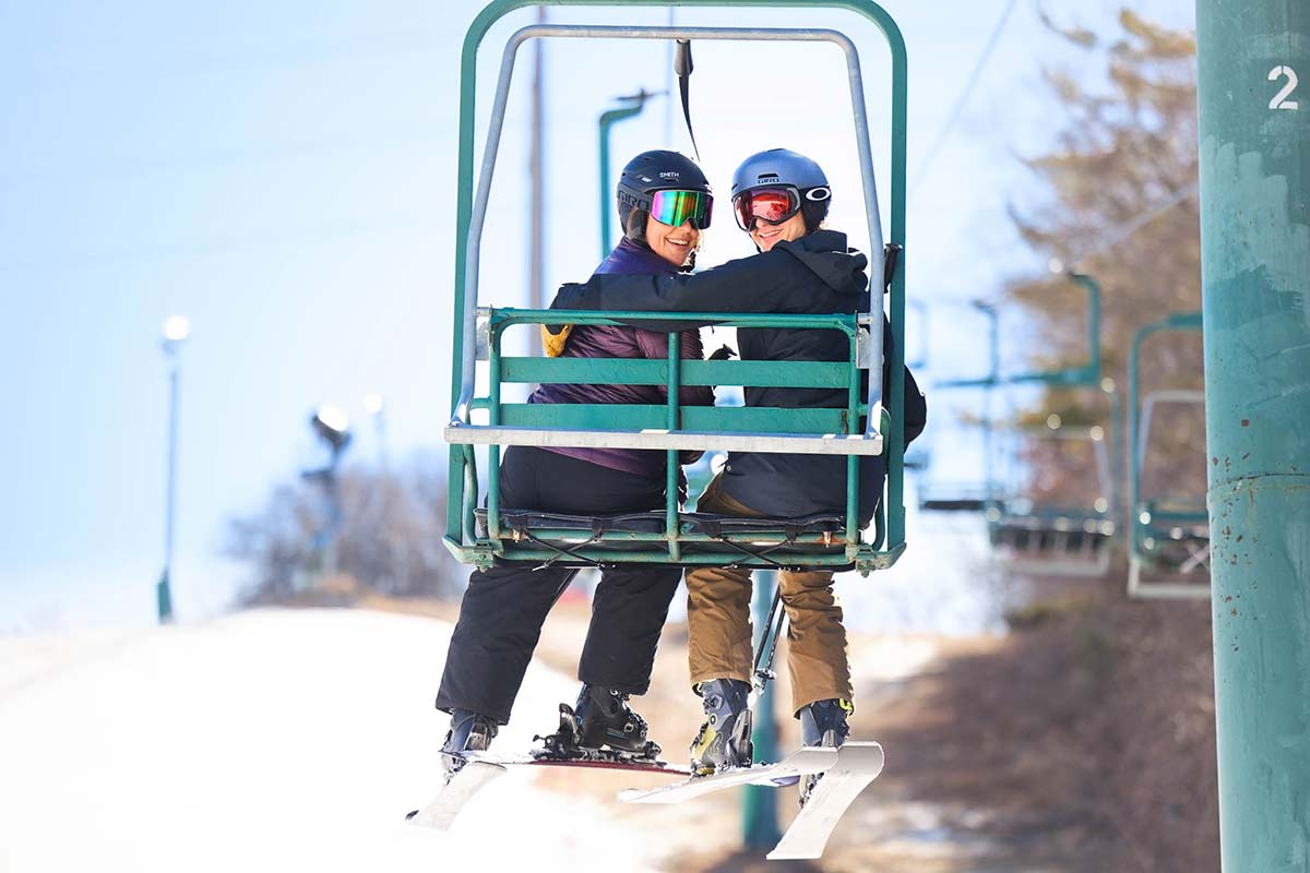 portrait-of-couple-on-lift-chair-from-behind