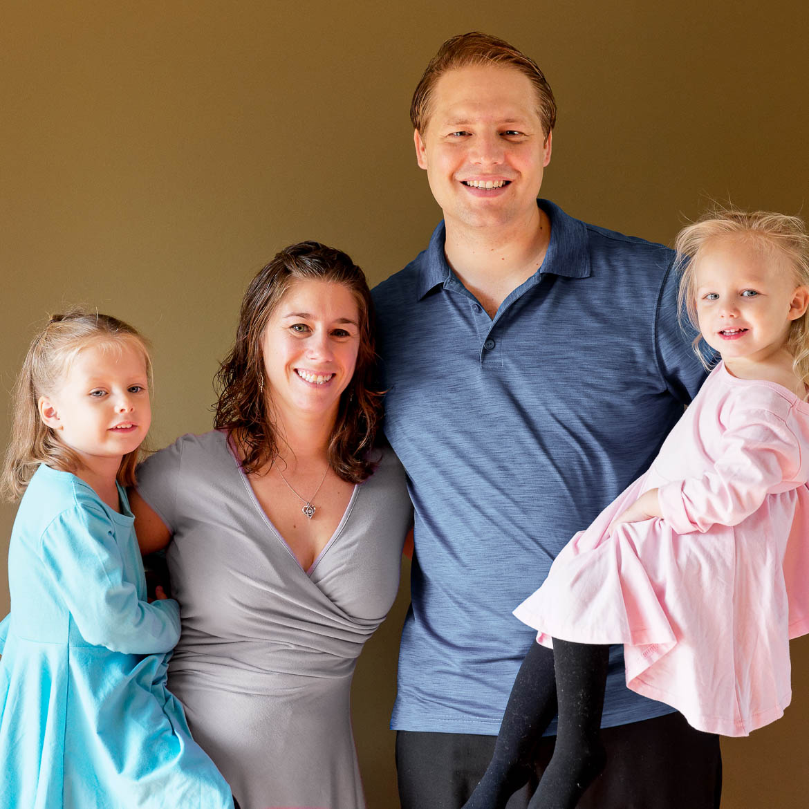 family dressed with ok colors