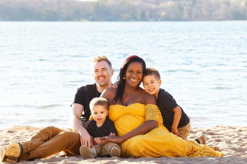 family photos on front of the lake