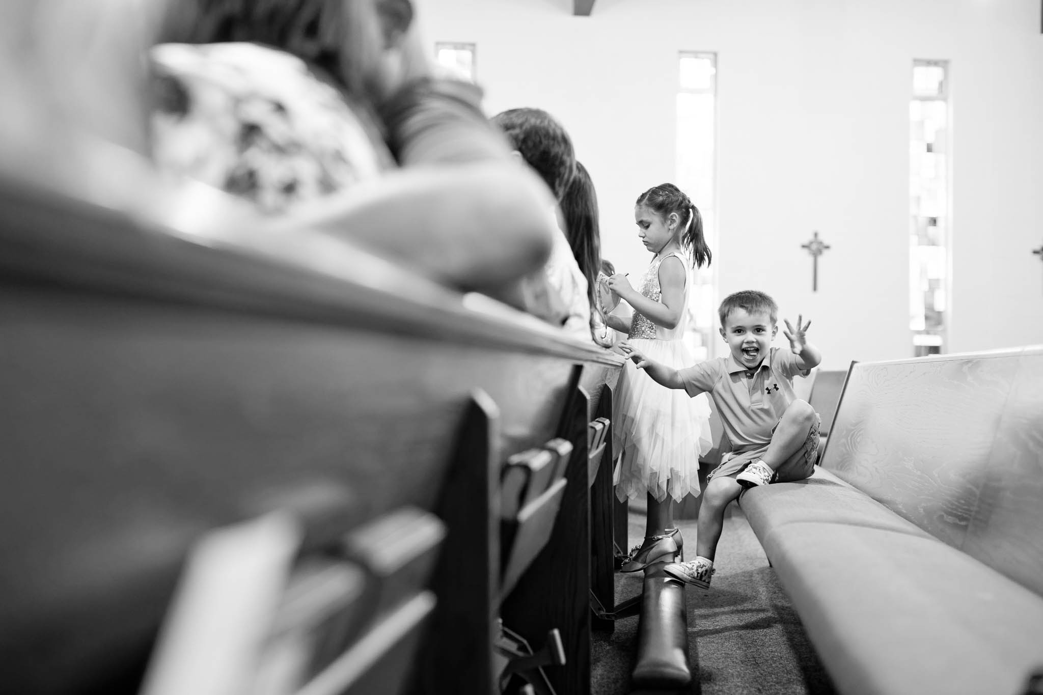 funy photos of kids Misbehaving during wedding ceremony at Saint Peter and Paul Catholic Church Mazzepa MN-6