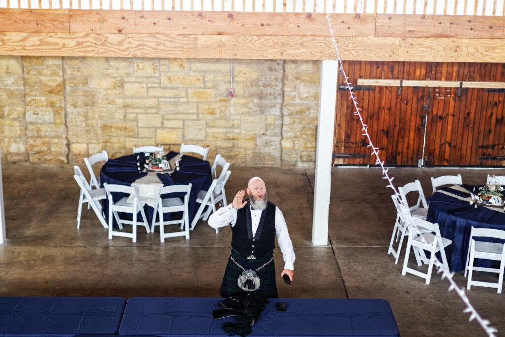 Groomsmen at the first floor, talking with groom at second floor