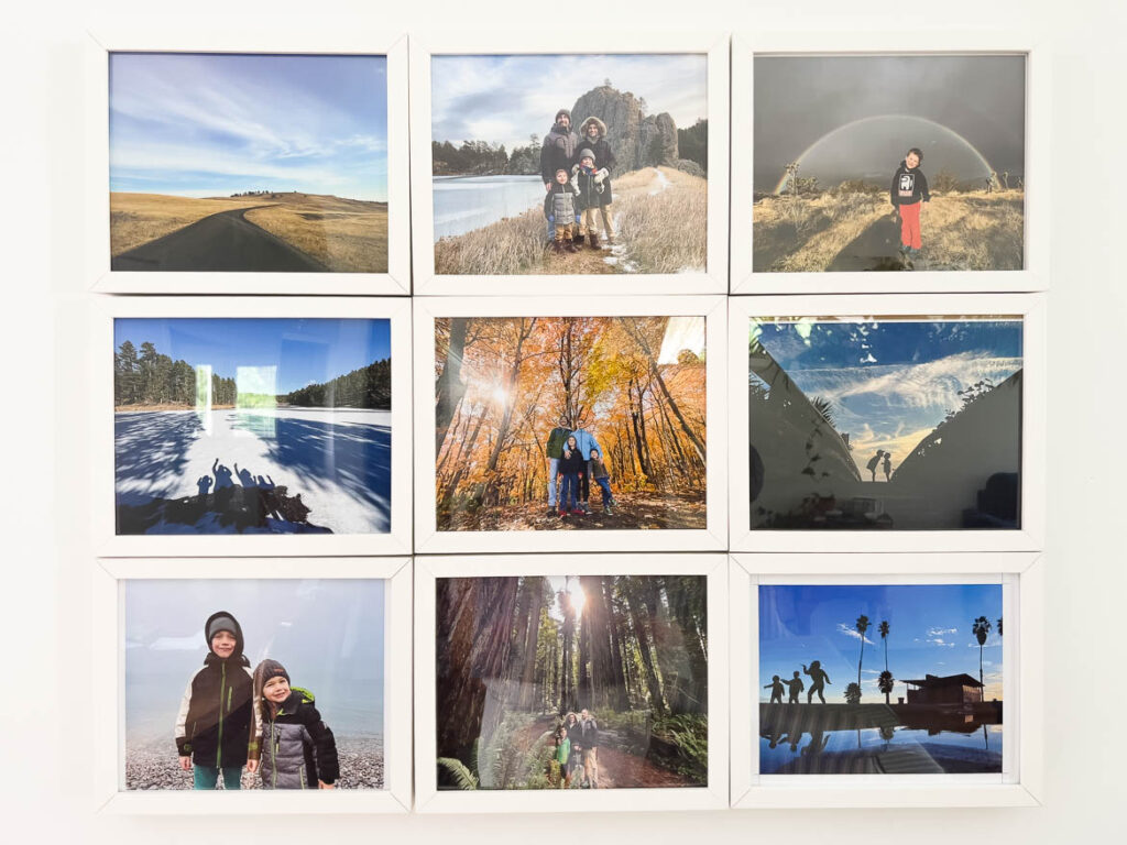 home made wall tile display for family pictures