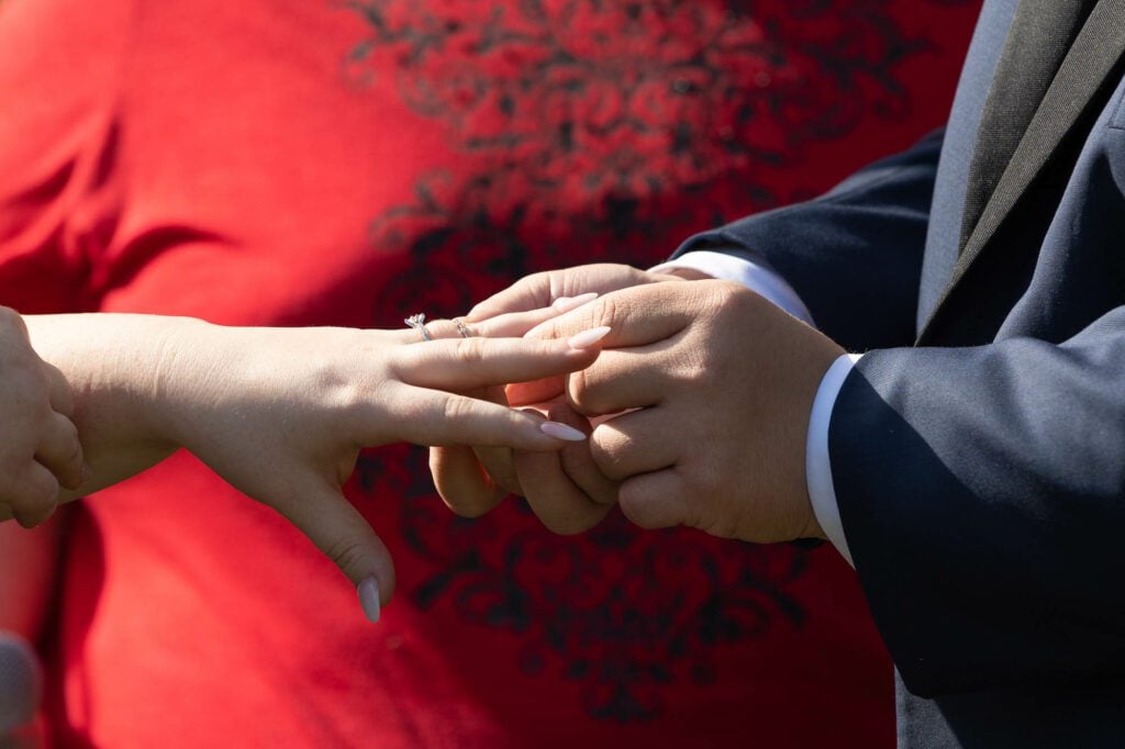 officiant with red shirt