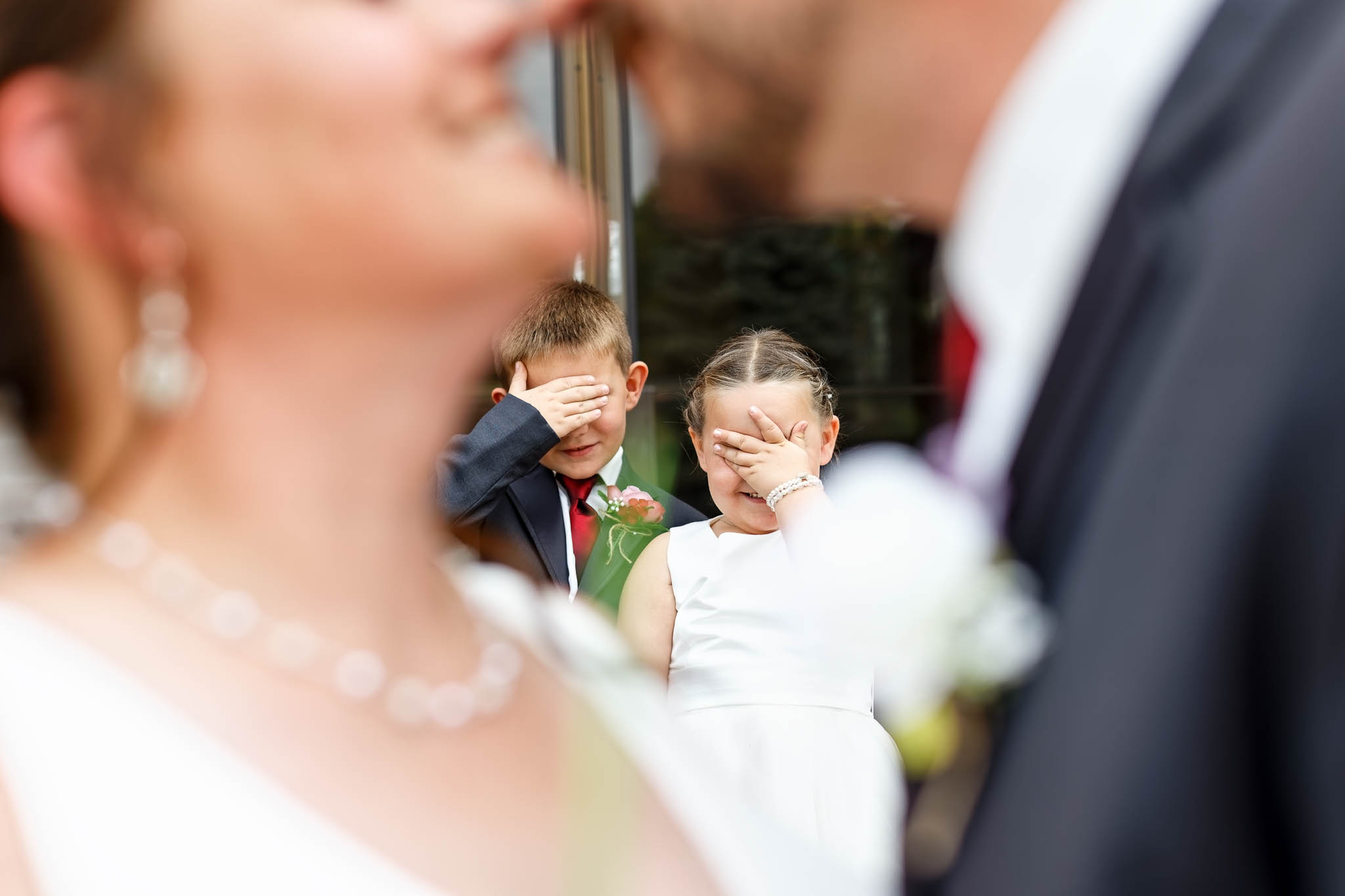 bride and groom first look with kids