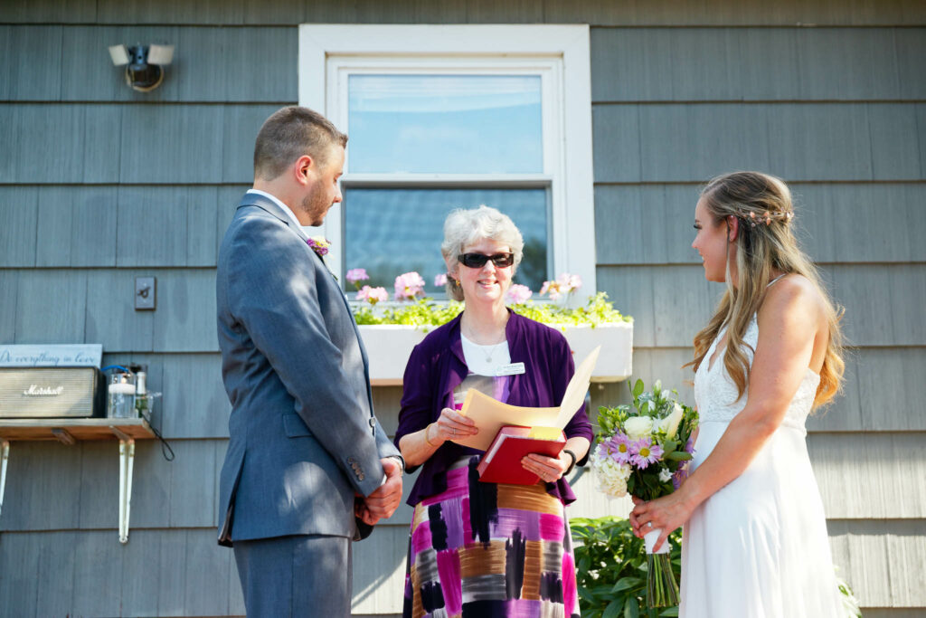Backyard wedding ceremony in Rochester with officiant