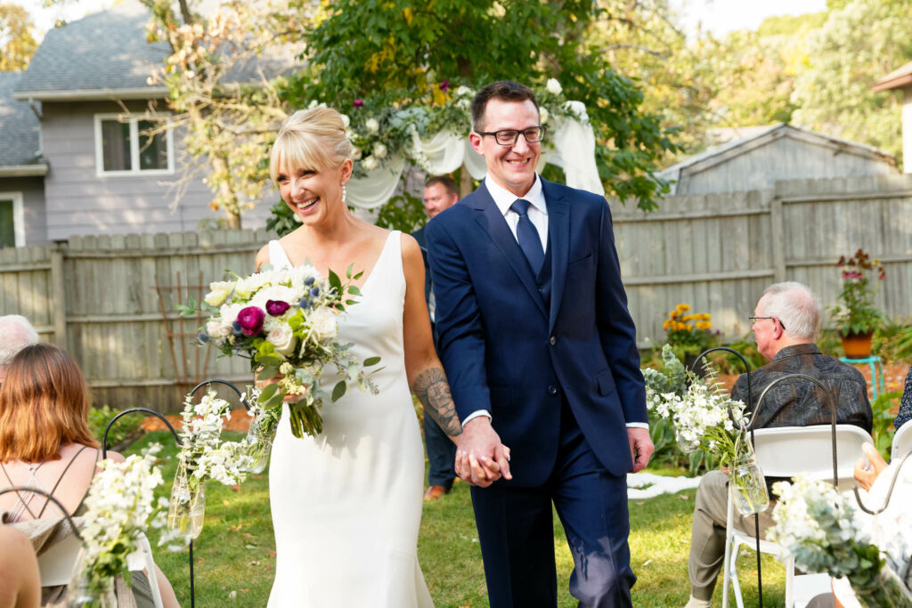 exiting backyard wedding ceremony