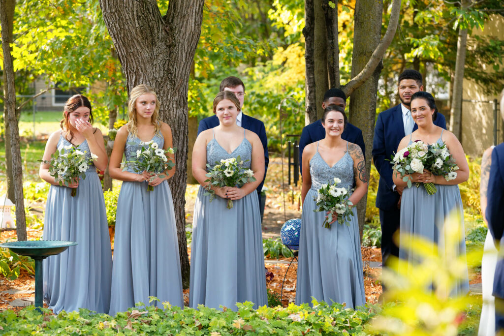 wedding party during ceremony backyard
