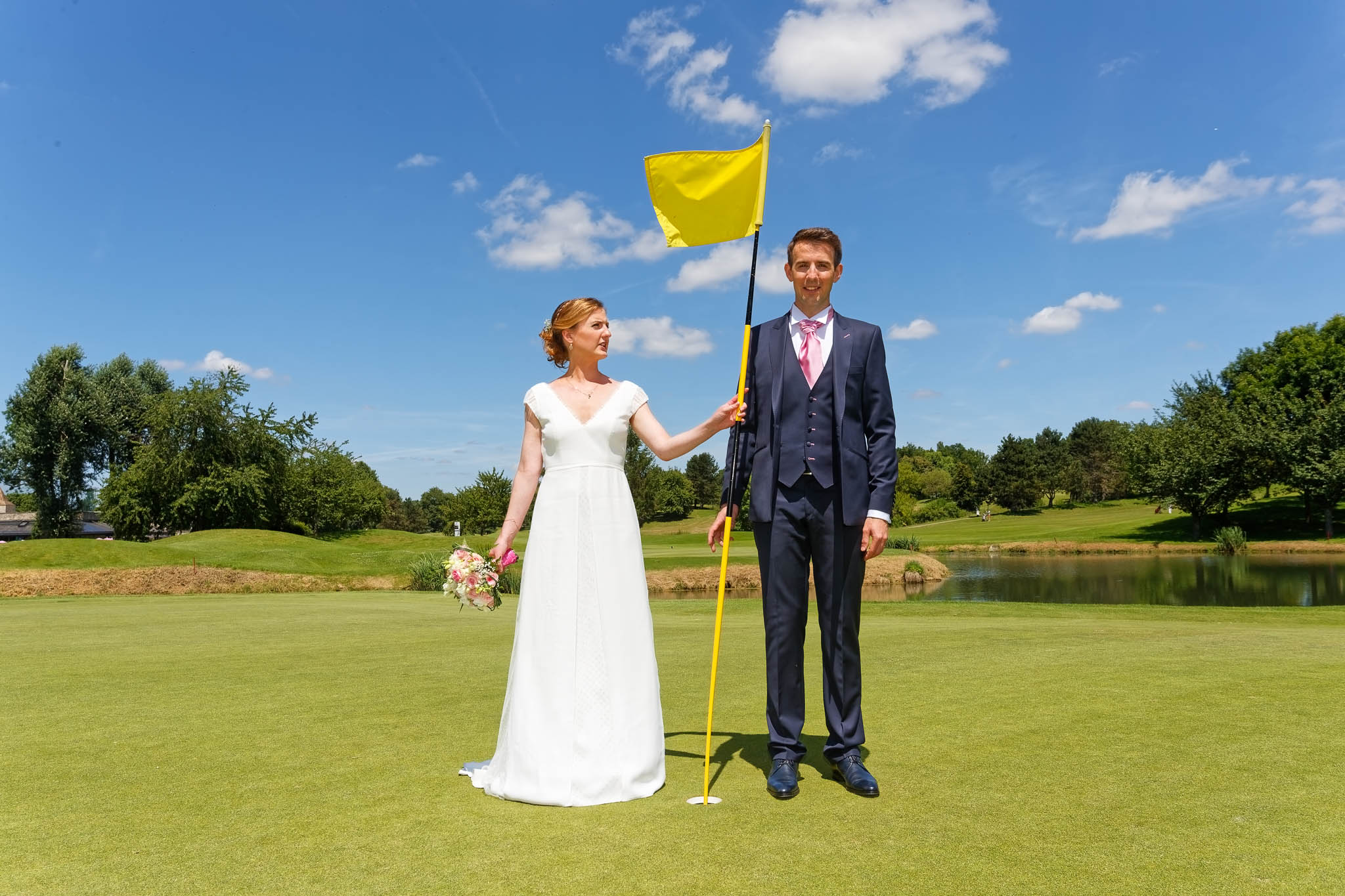 bride and groom golf