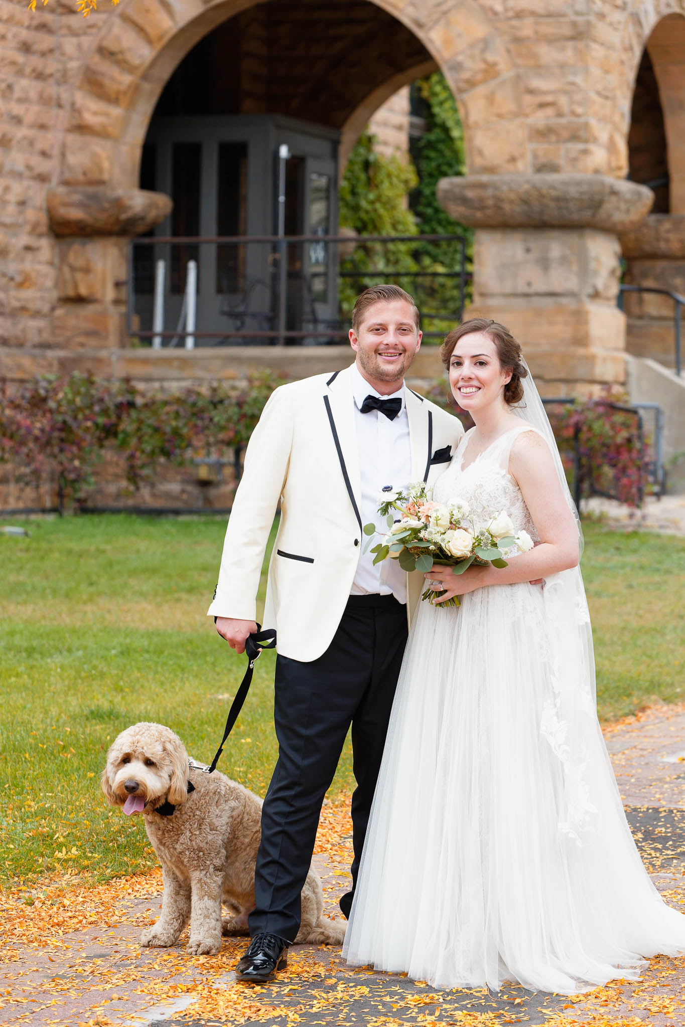bride groom and dog during couple session