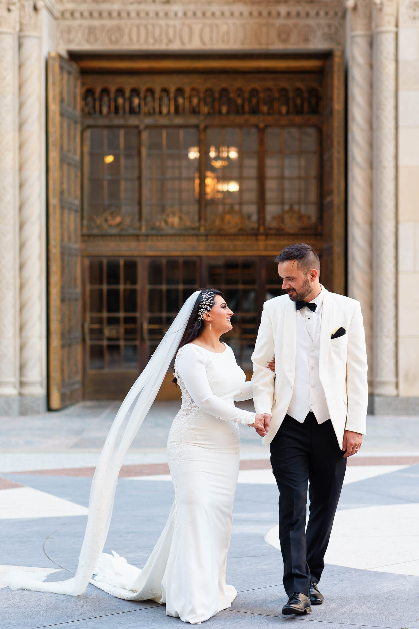 bride and groom plummer building rochester downtown white suite