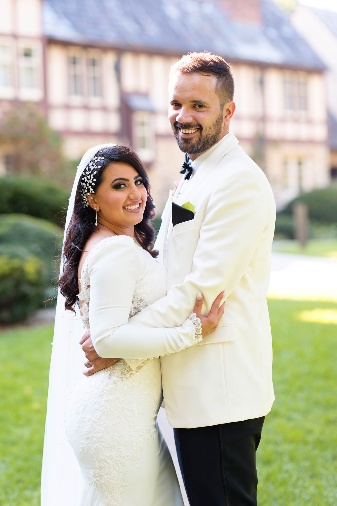 bride and groom white jacket
