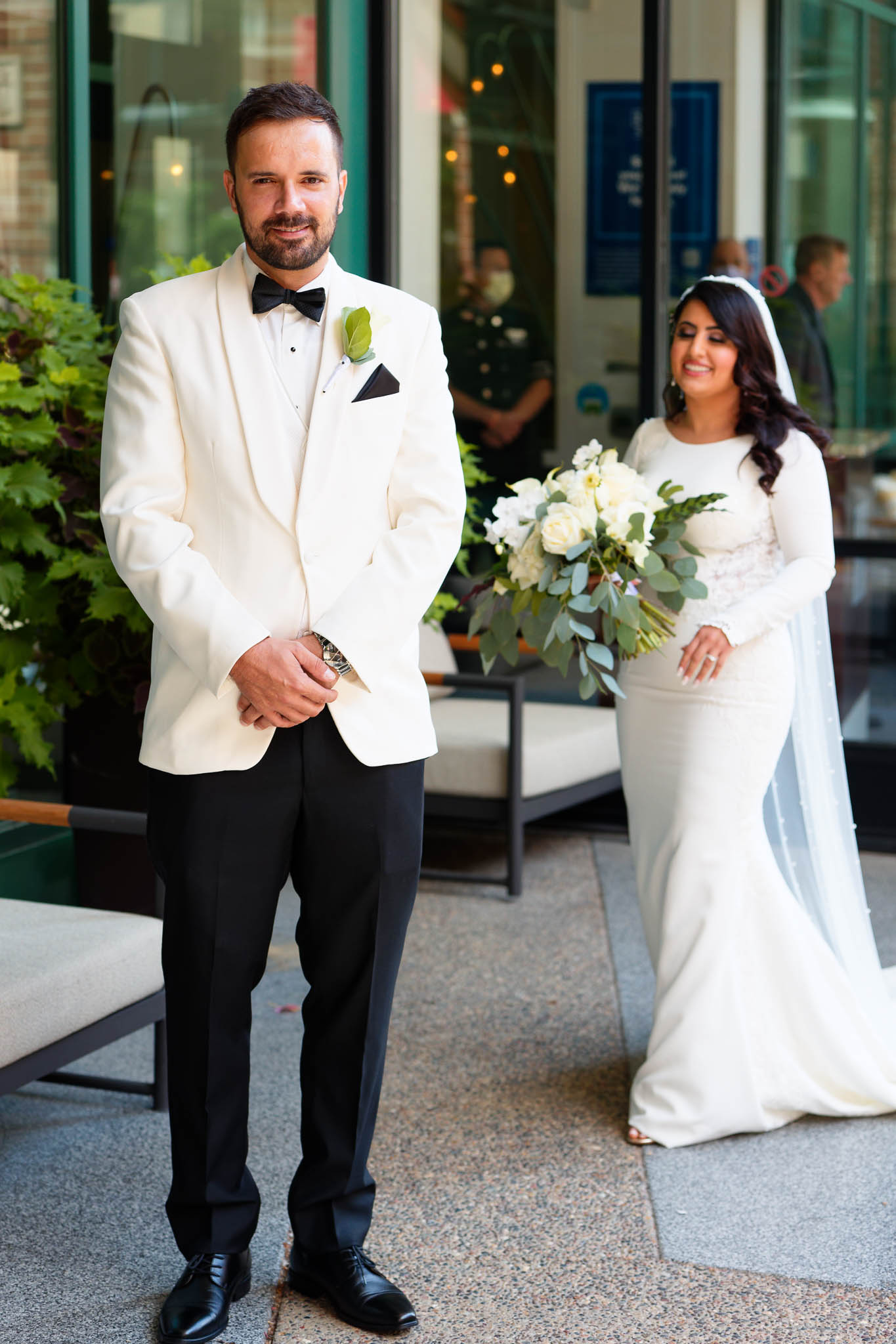 First Look of the Bride and Groom in front of the hotel