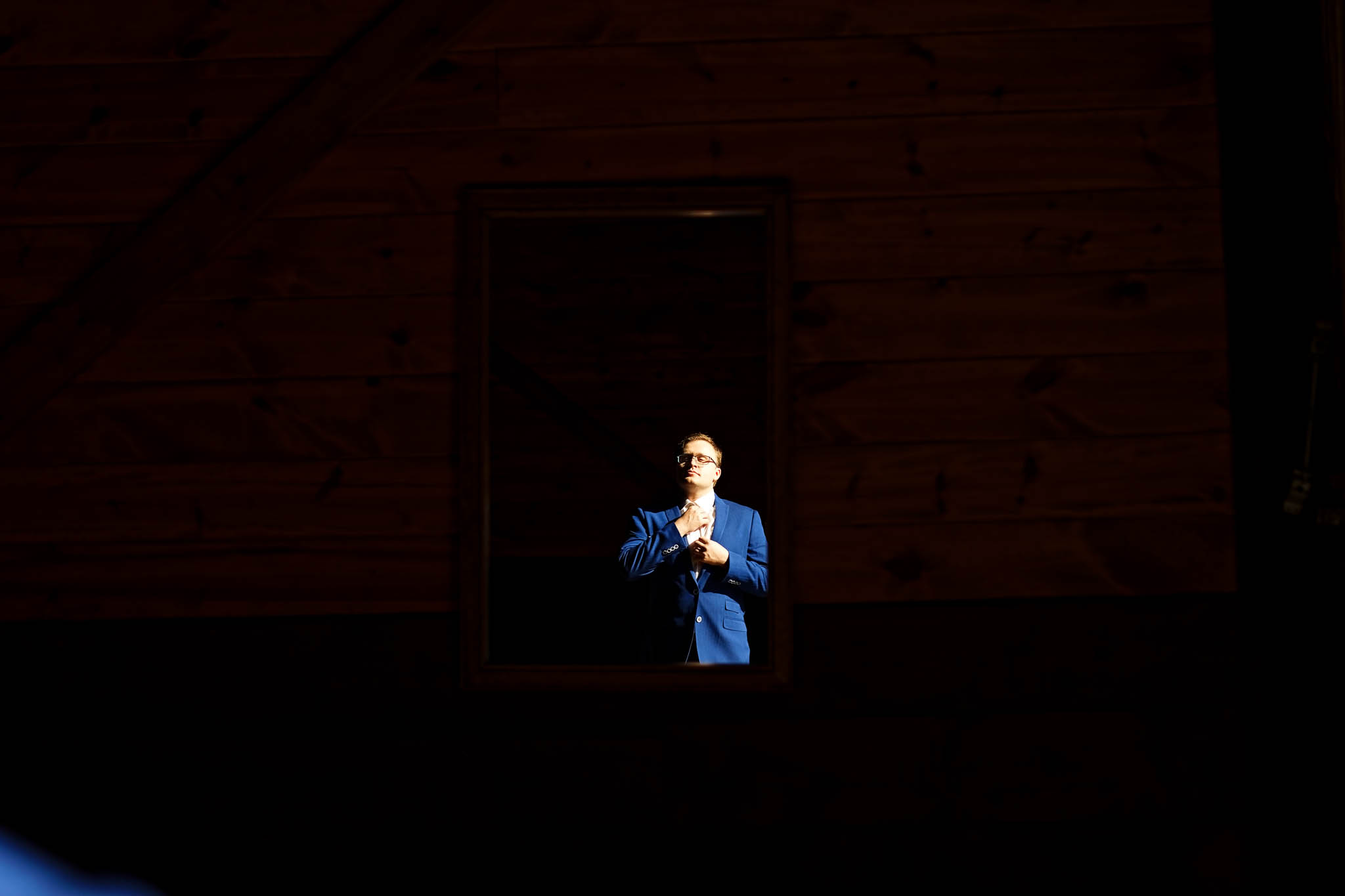 Groom Getting Ready at the Mayowood Stone Barn