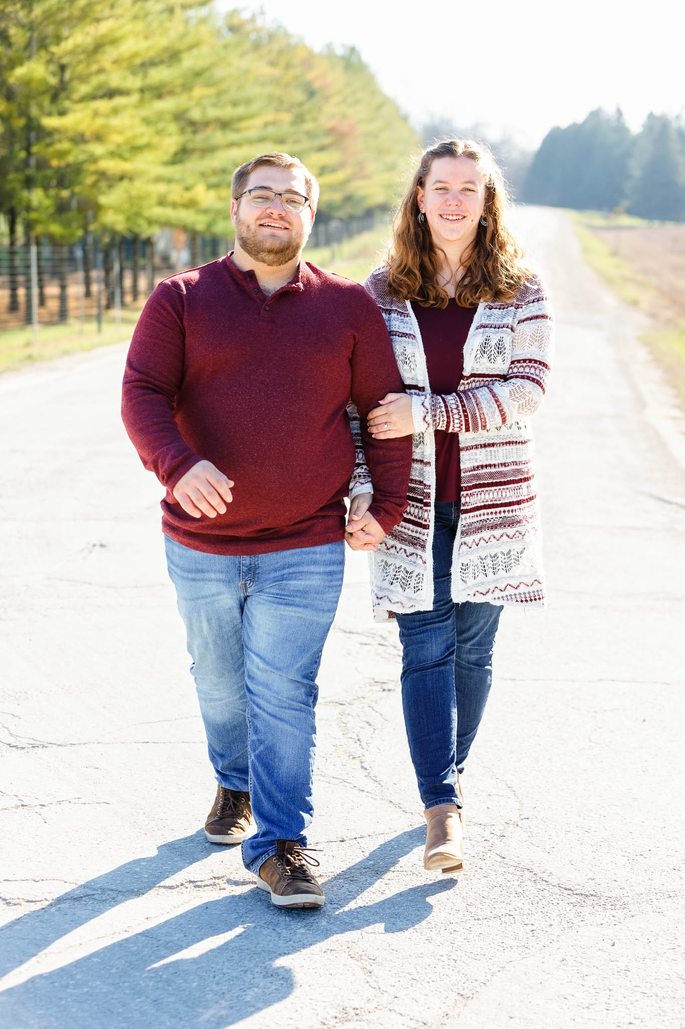 couple walkng on dusty road