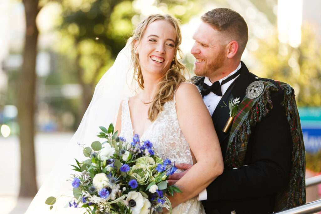 Bride and groom photo session downtown Rochester Plummer building