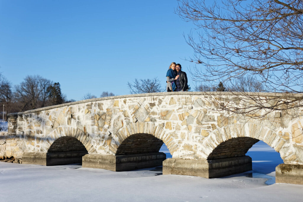 couple at silver lake park bridge