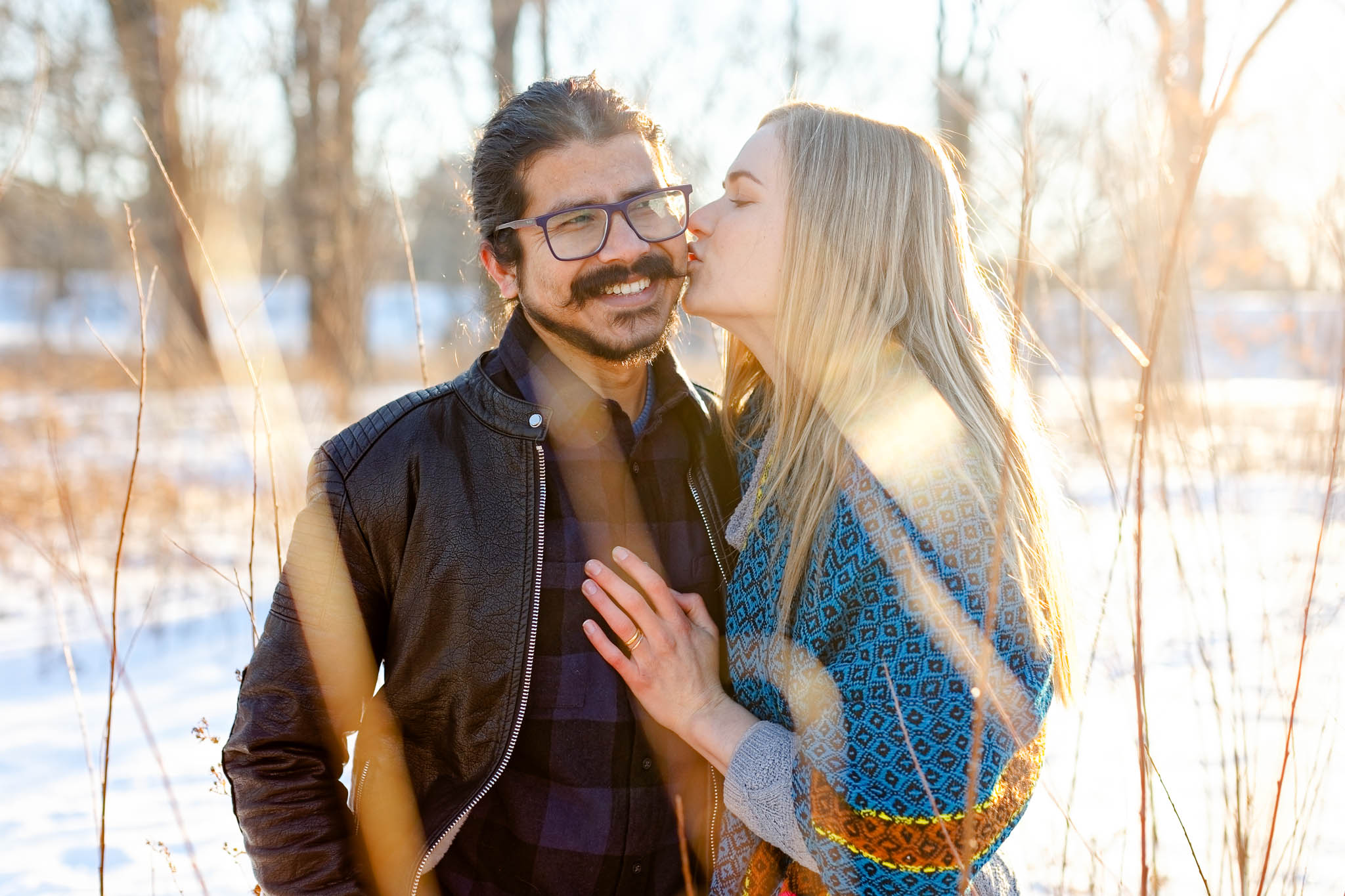 winter photo session couple rochester mn though high grass