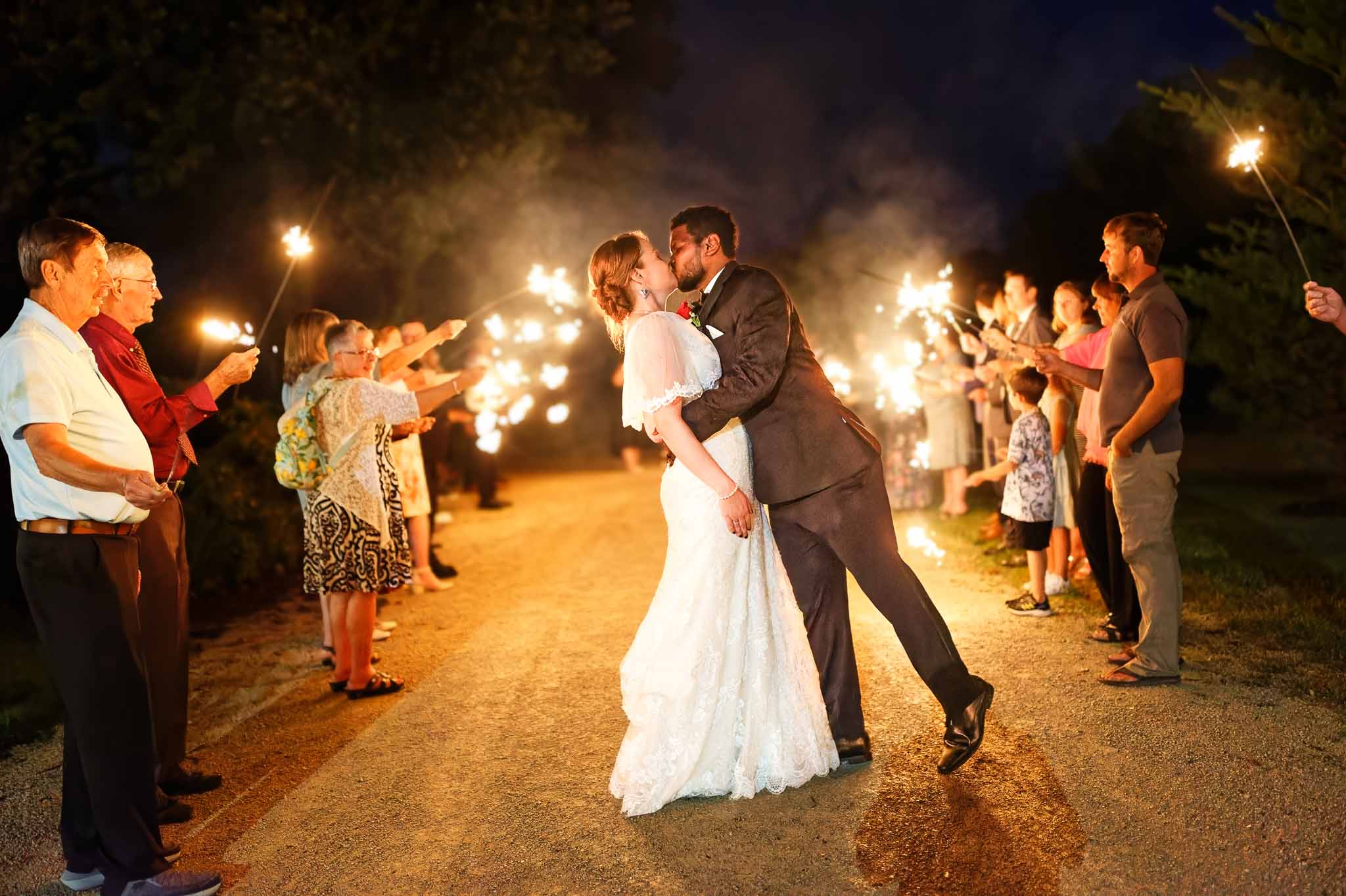 grand exit with sparklers bride and groom