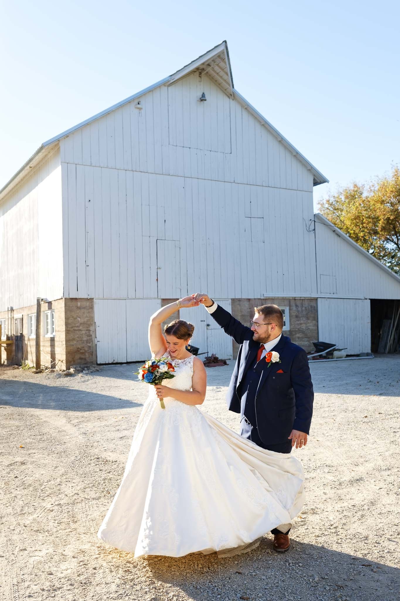 in front of the white barn