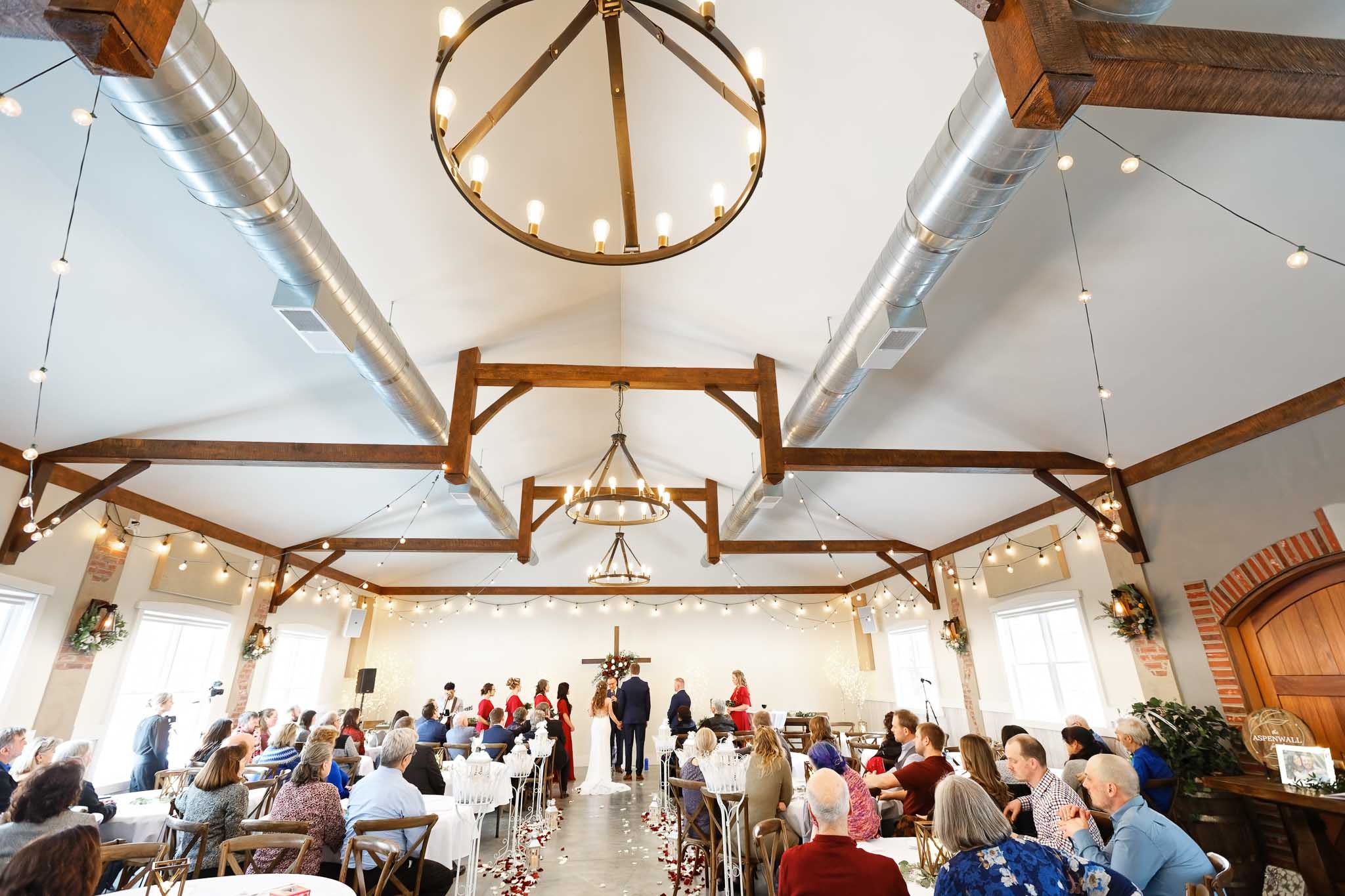indoor wedding ceremony at garten marketplatz rochester, mn