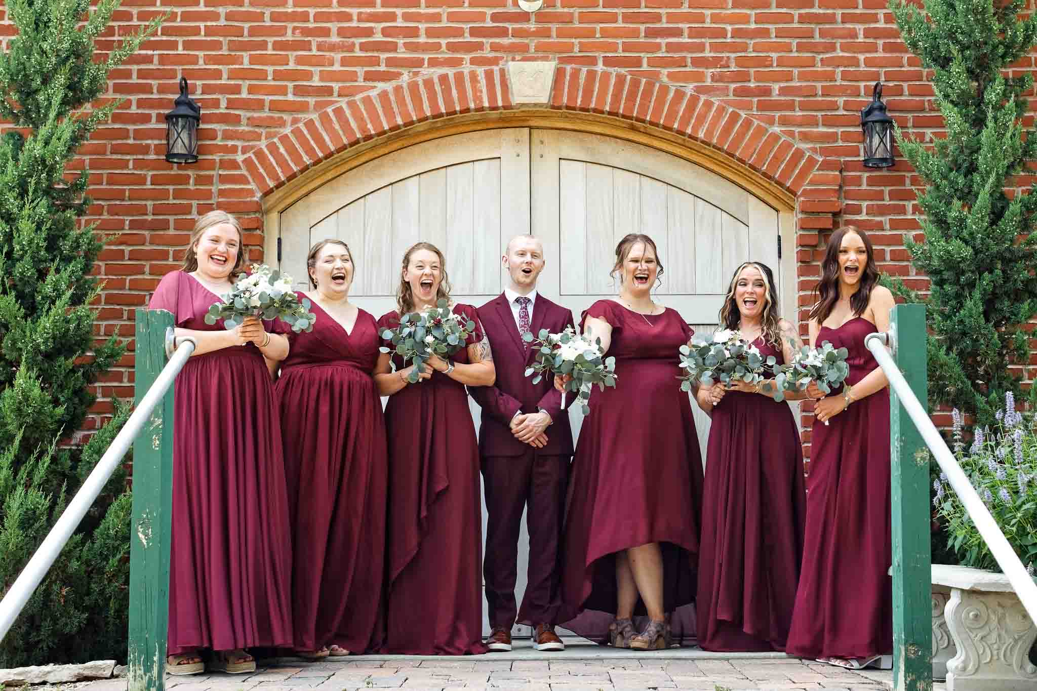 wedding party top of stairs