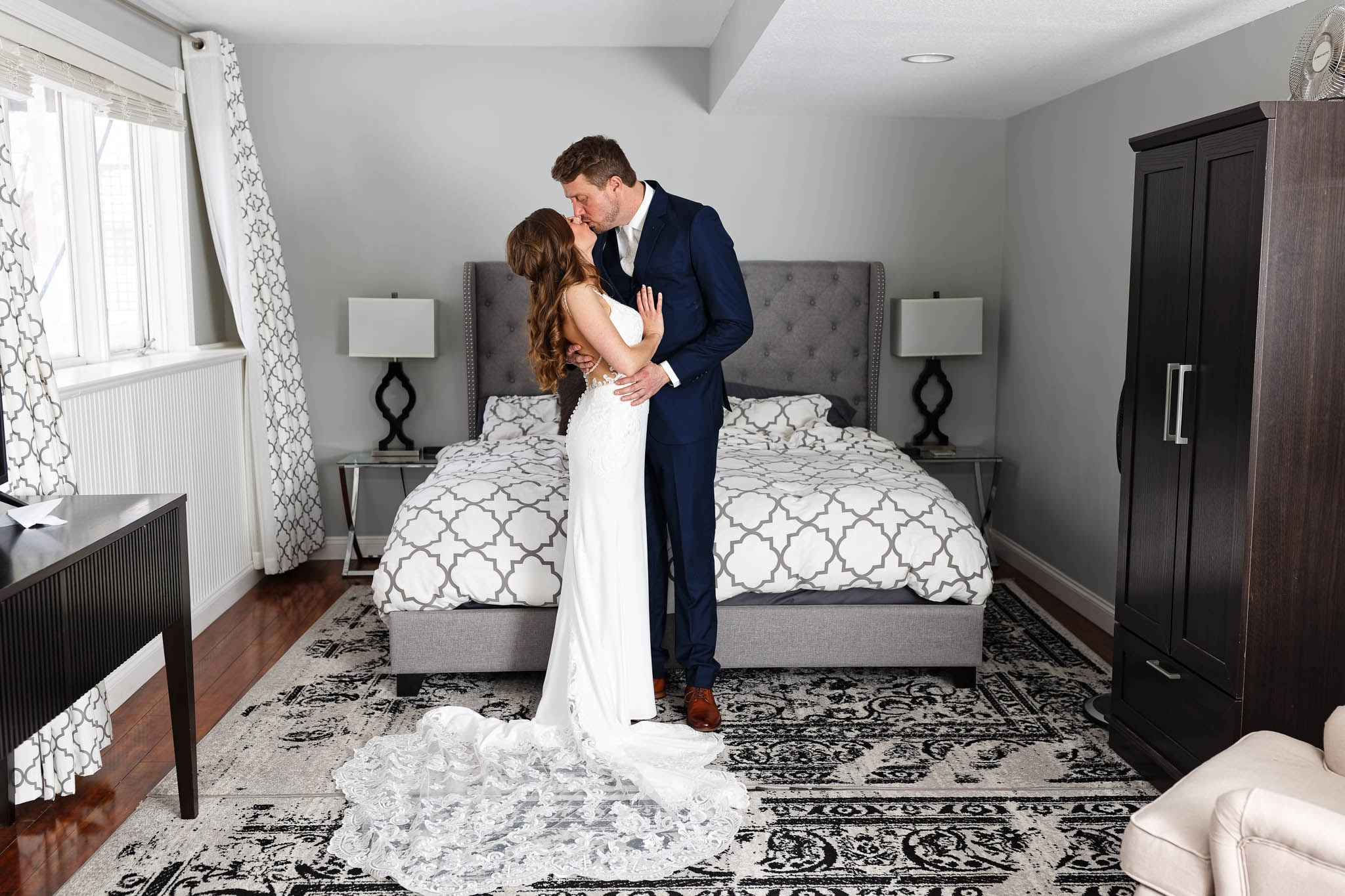 bride and groom kissing preparation airbnb rochester mn