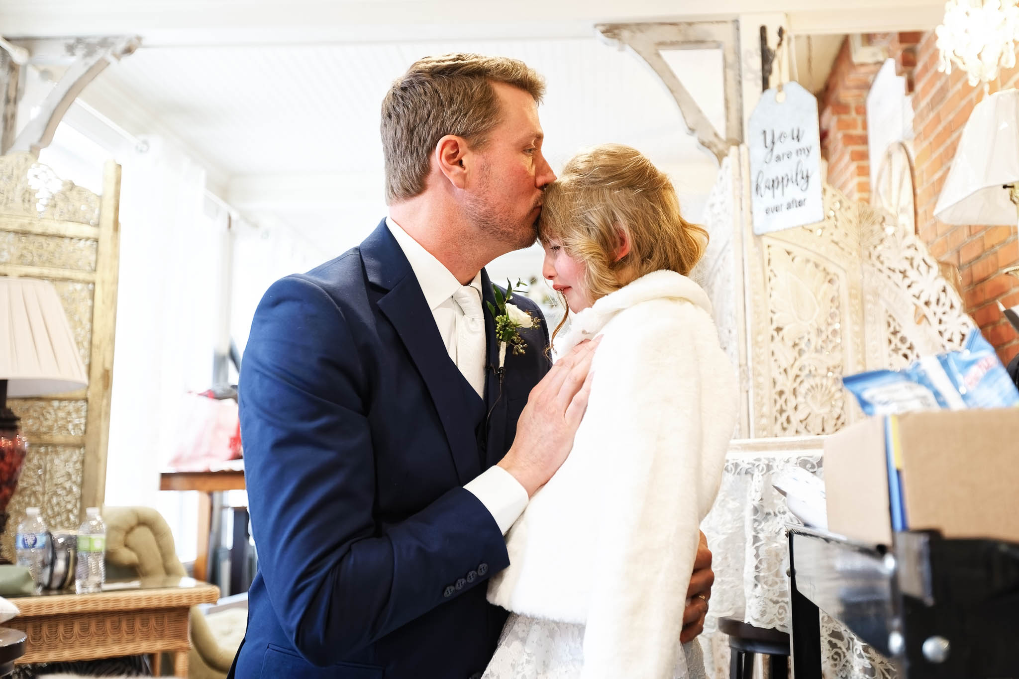 Groom Kissing his daughter