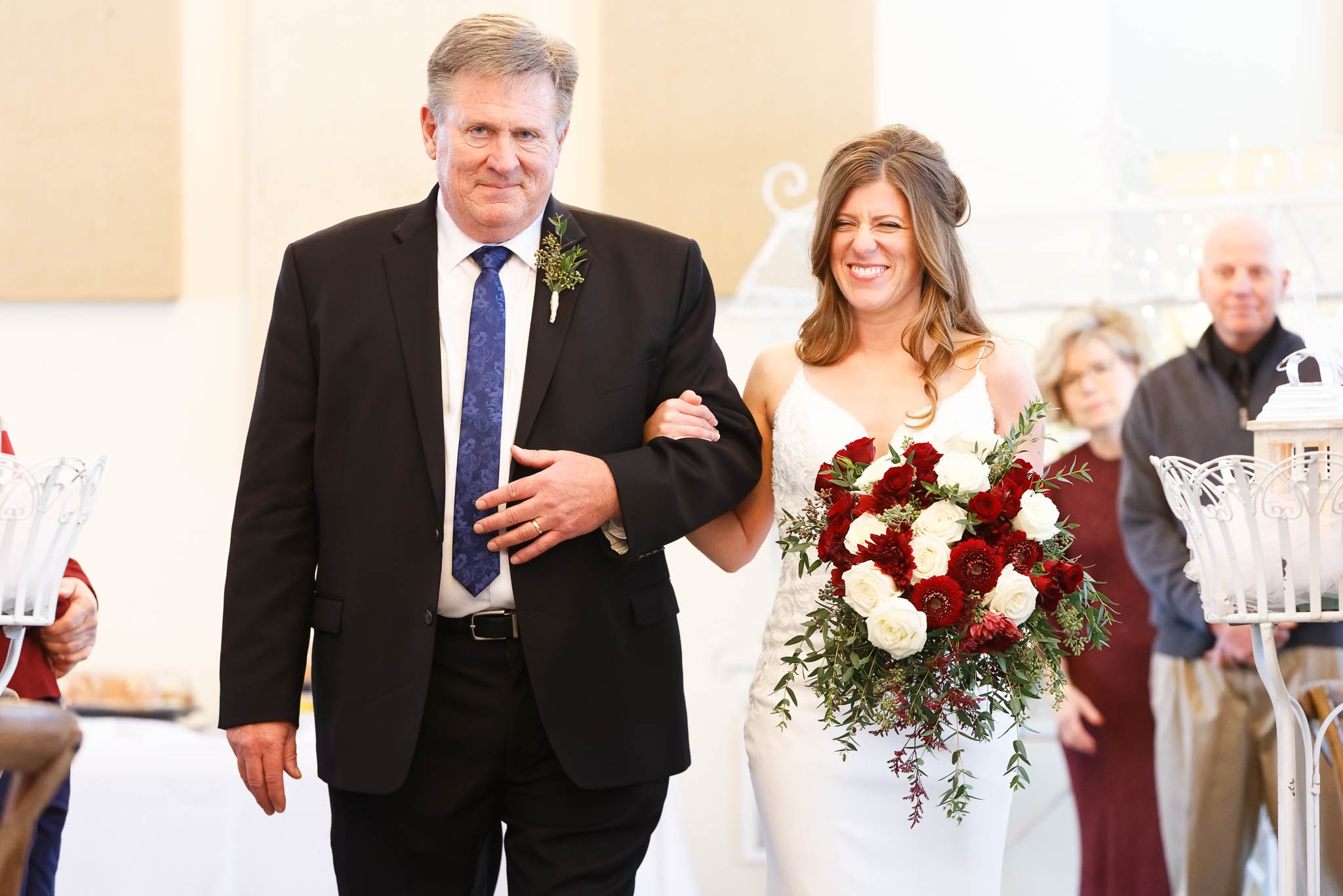 The bride and her father walking down the aisle