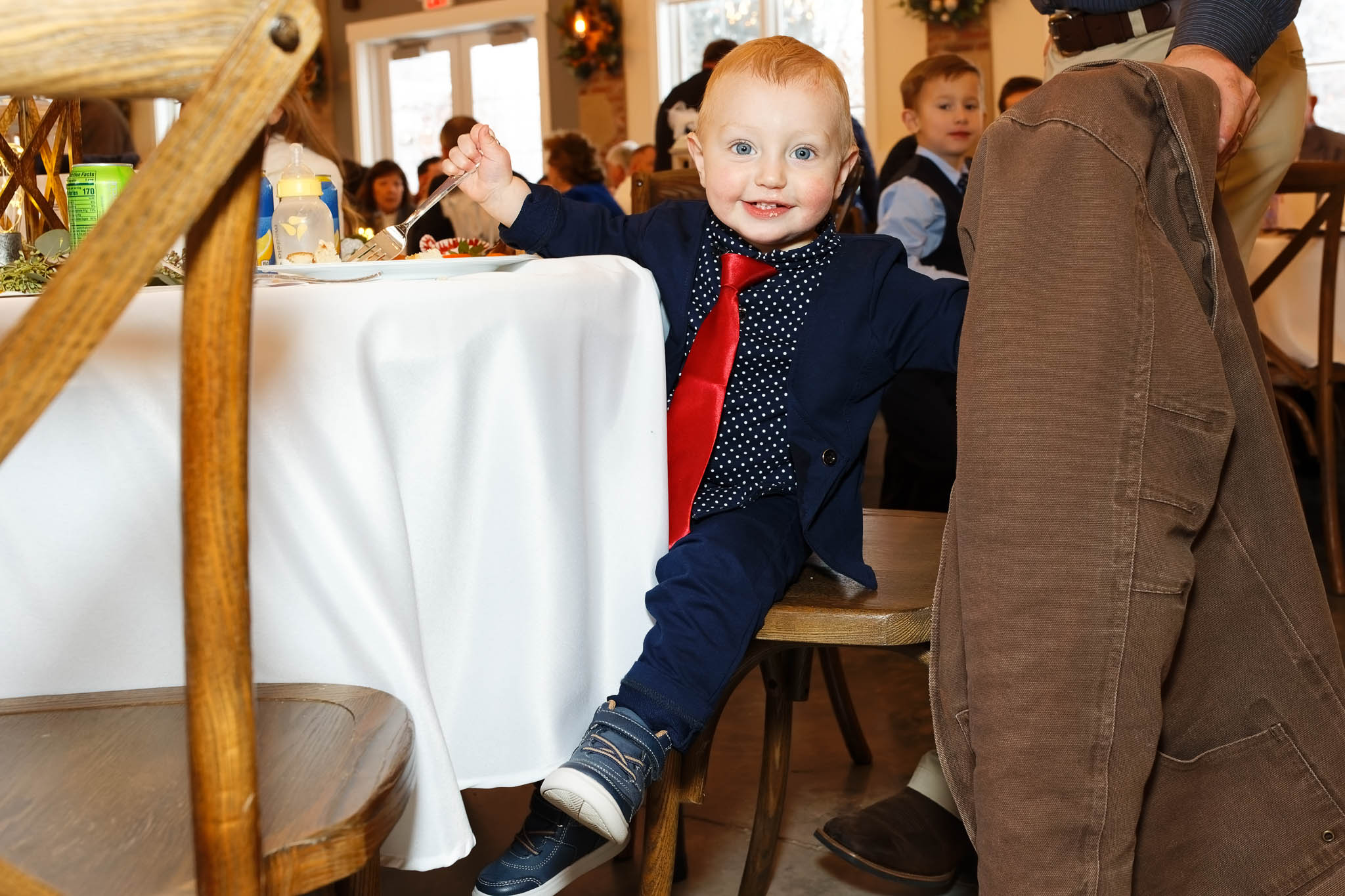 Toddler with red tie