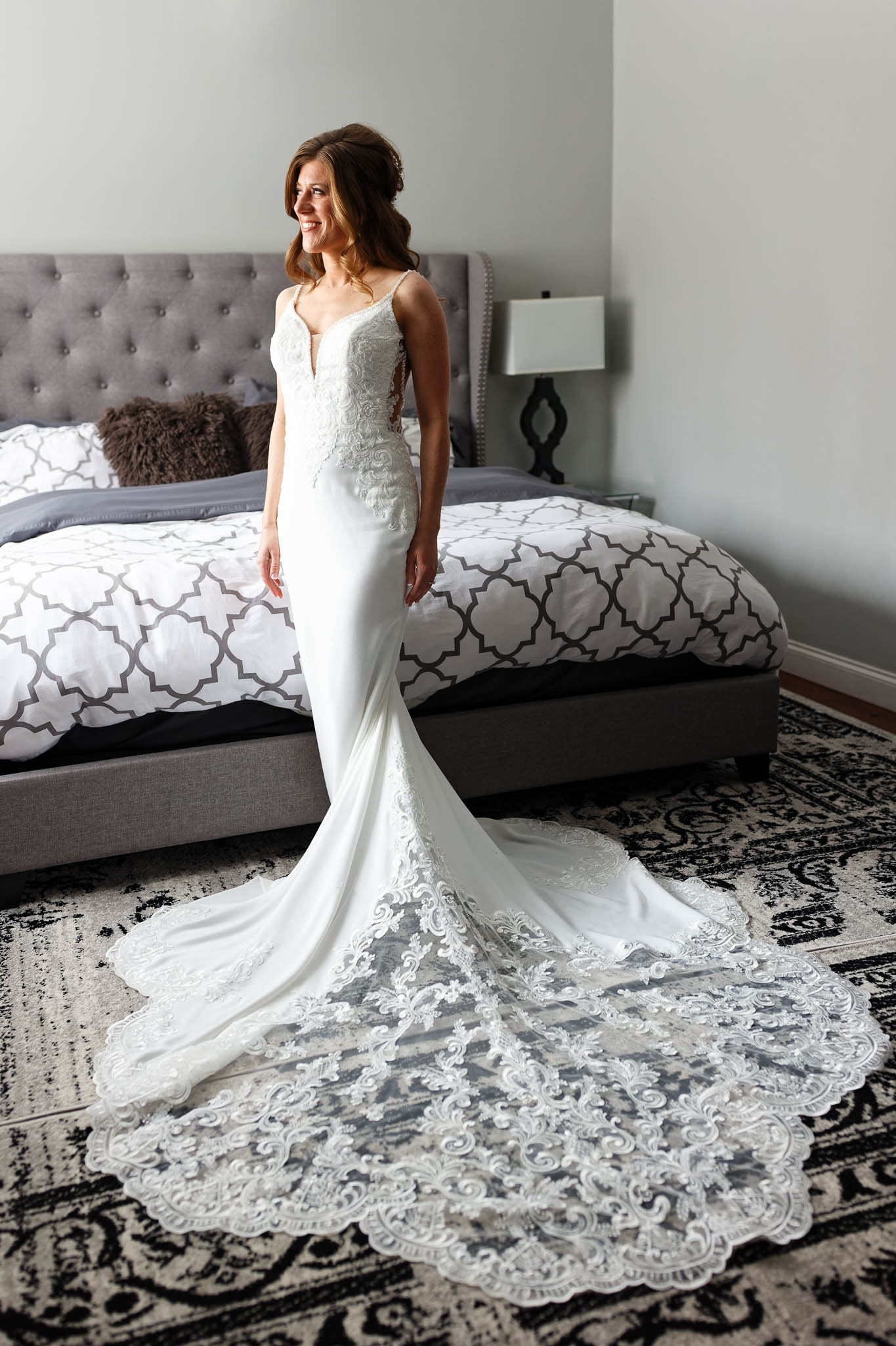 Wedding prepration at Airbnb bride standing in her dress