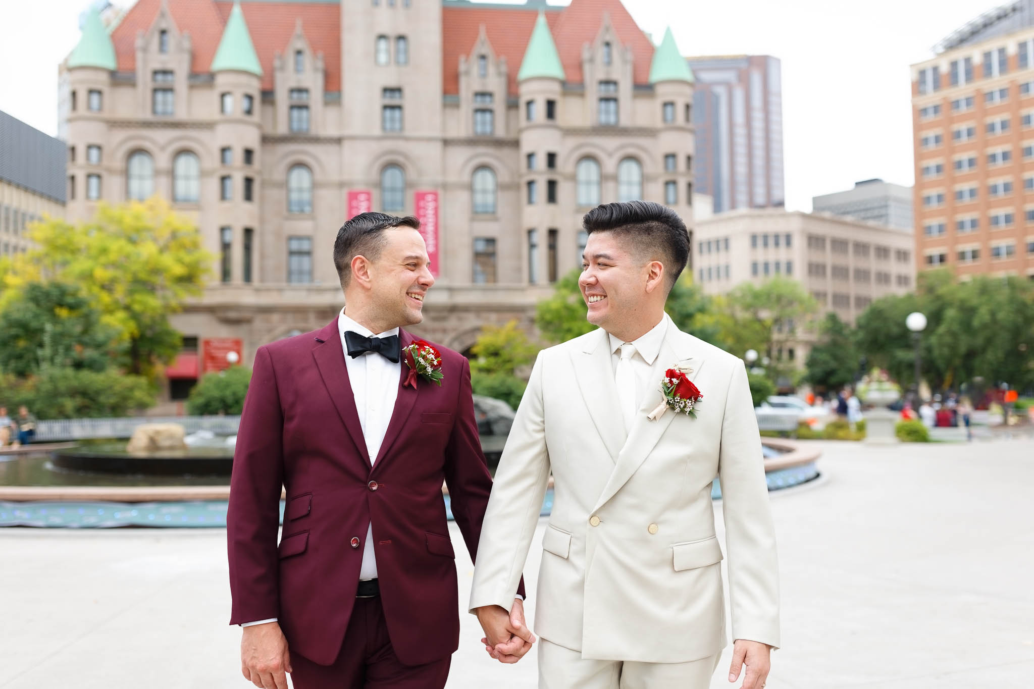 gay couple red and cream suits