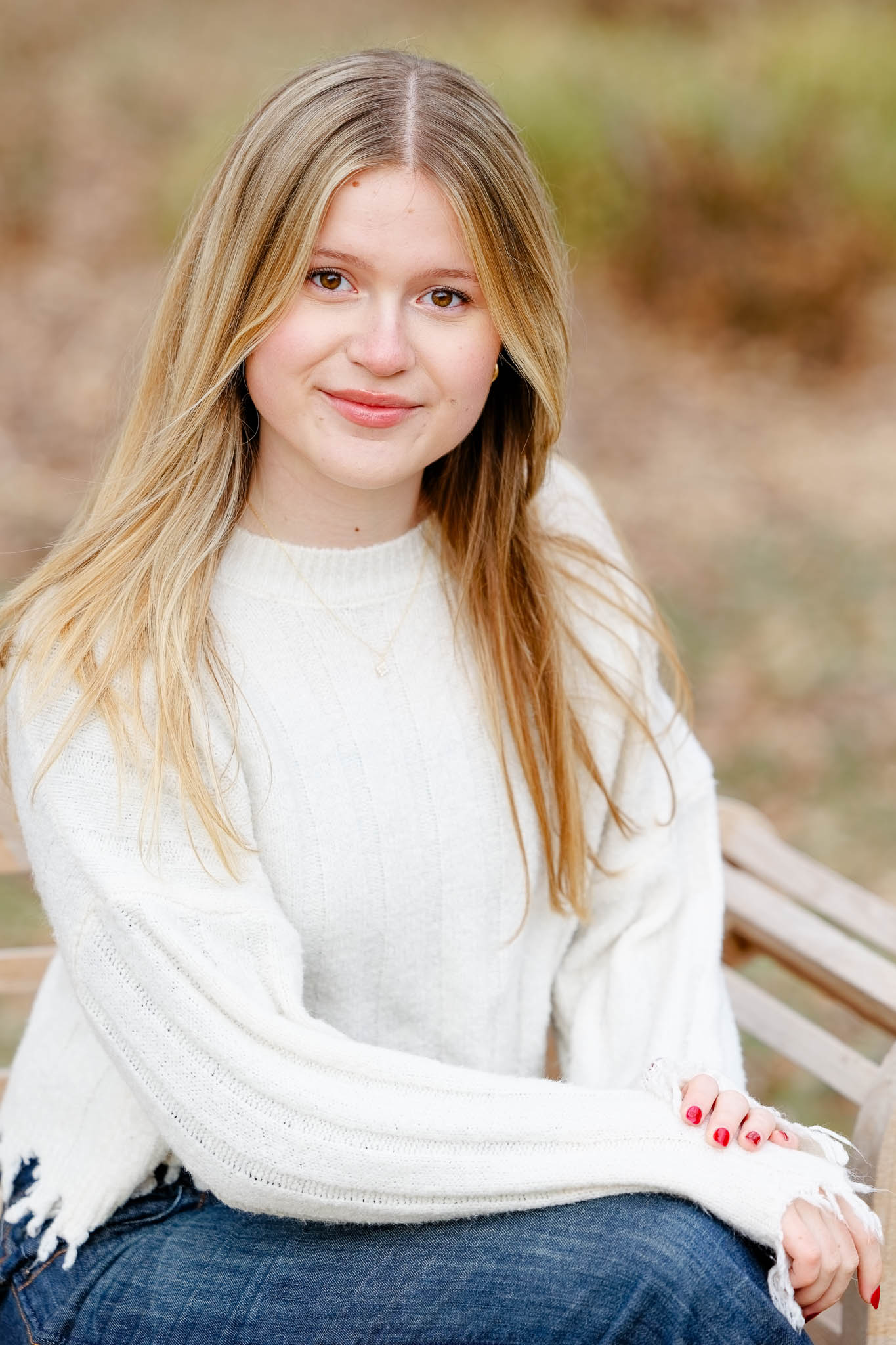 High School Senior portrait white sweater blue jean$