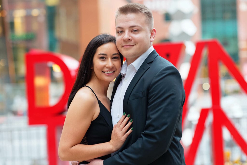 Chic Engagement session Rochester downtown sign