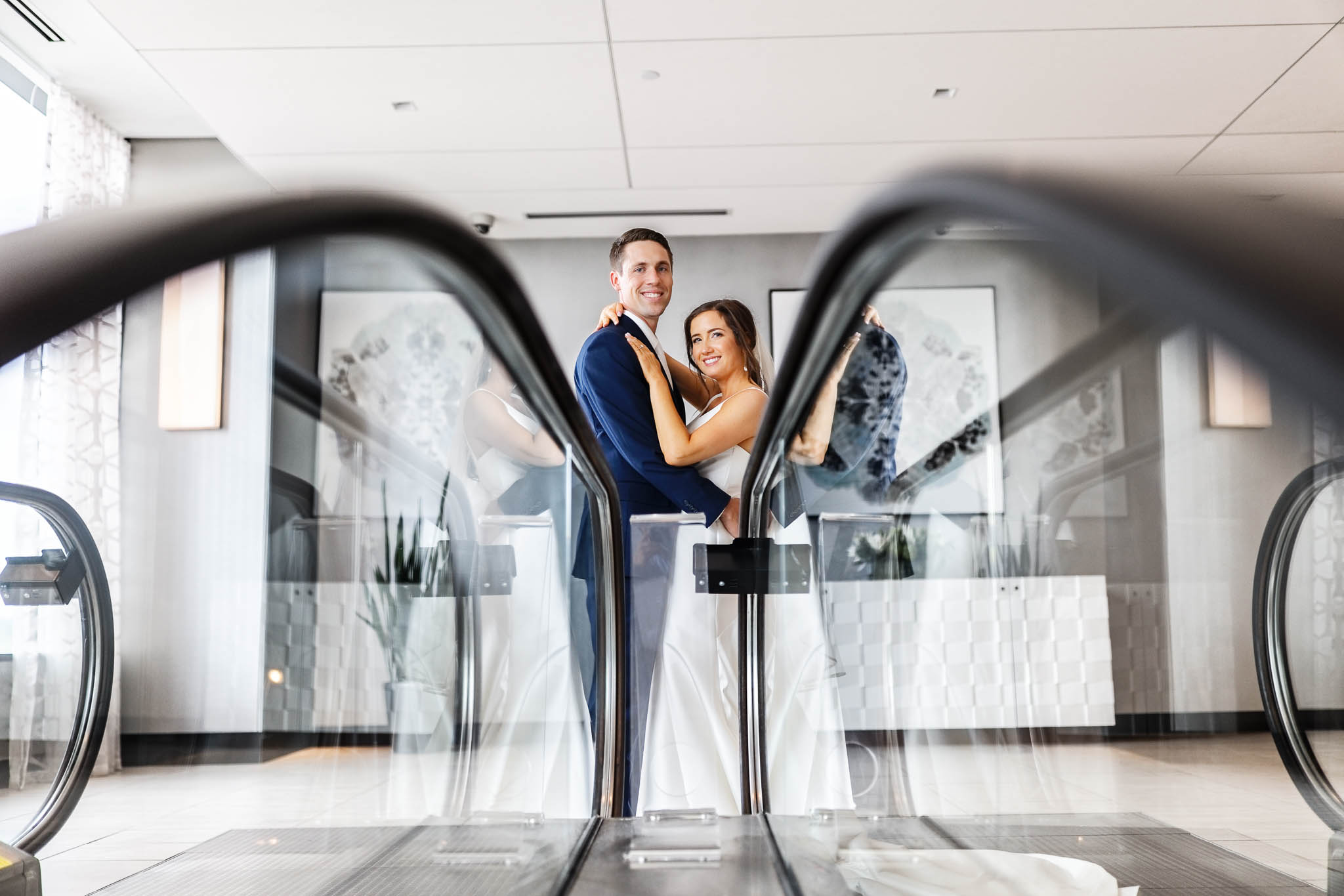bride and groom photos in with the escalators_