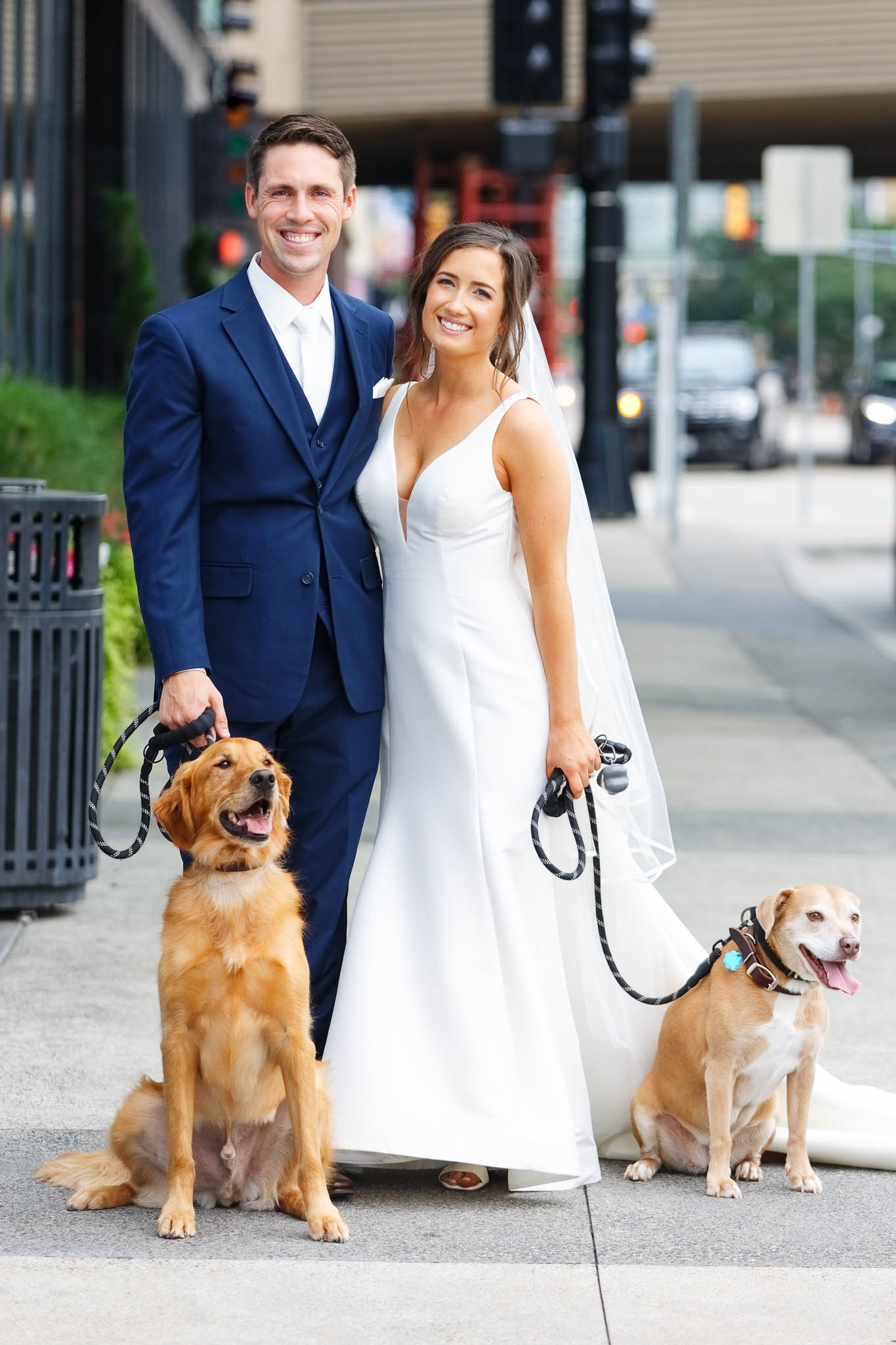 bride and groom with their dog